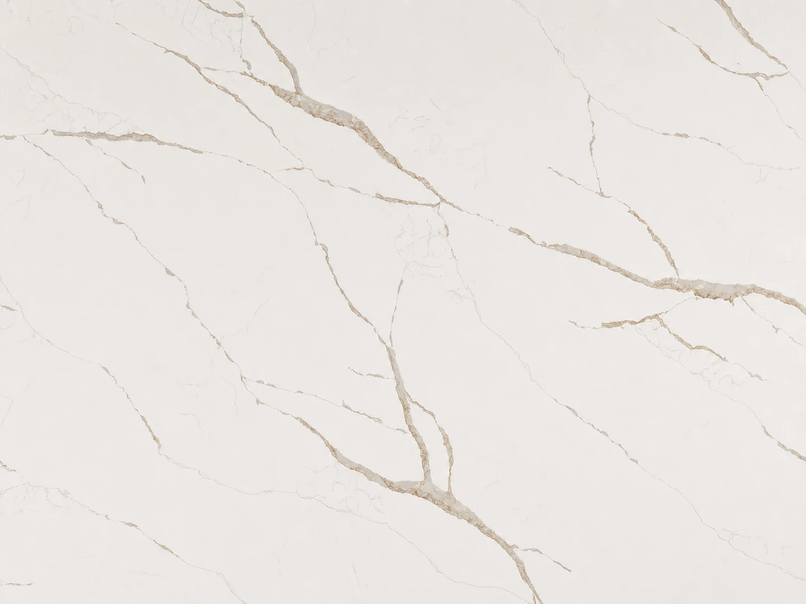 Calacatta Laza Oro quartz surface with warm gold veining