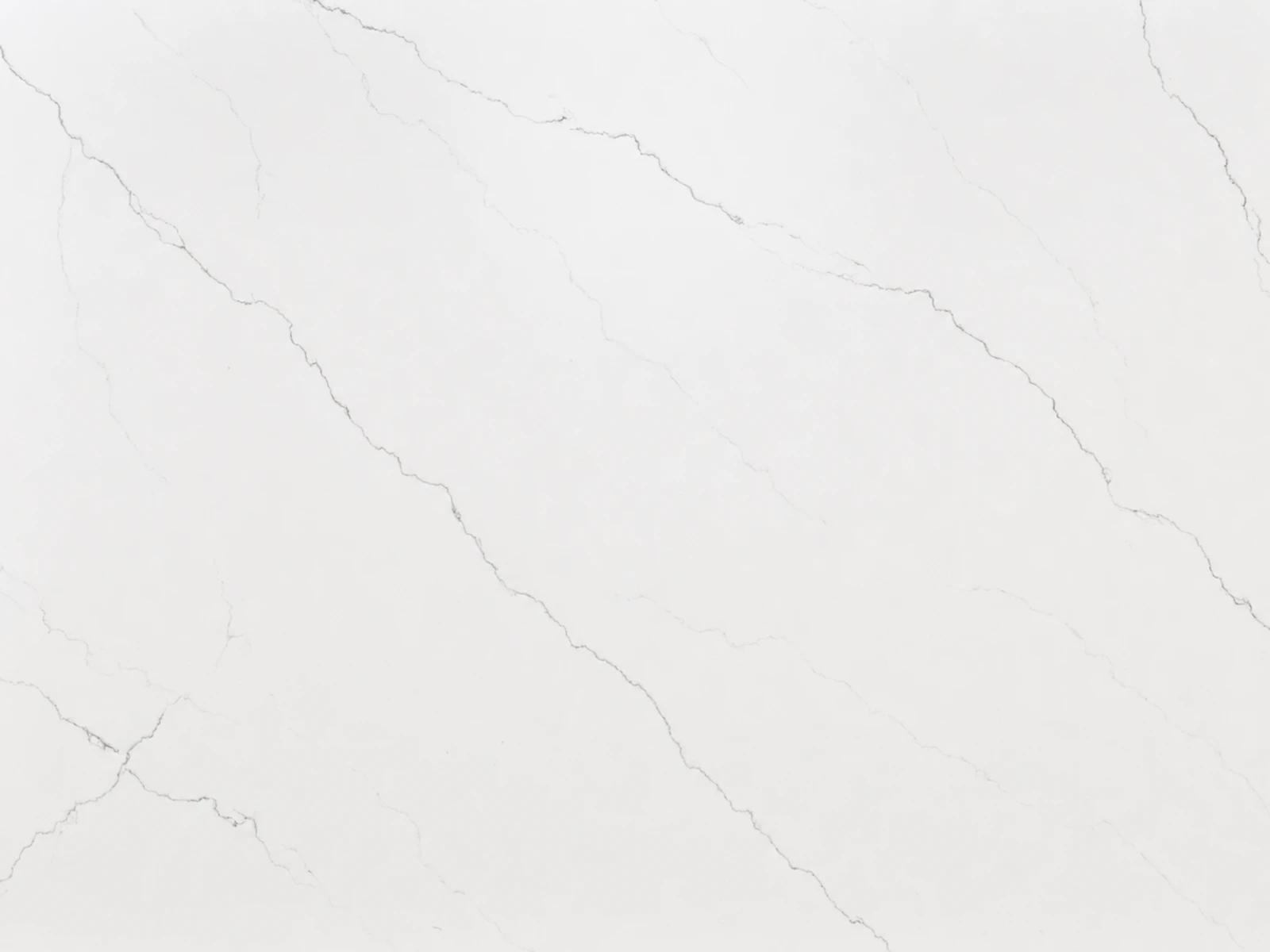 Calacatta Miraggio quartz surface with soft gray veining